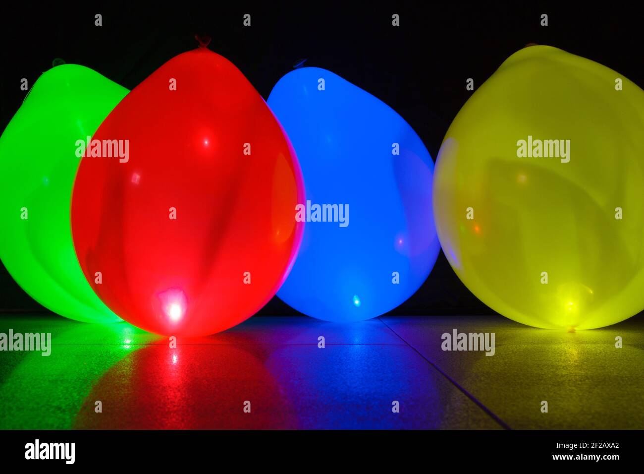 Balloons, illuminated baloons, 4 baloons, green, red, blue, yellow, xmas, birthday, celebration, bacground, Stock Photo