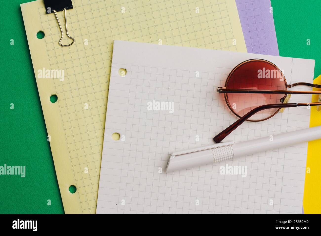 office glasses notepad paper pen the office work Stock Photo - Alamy