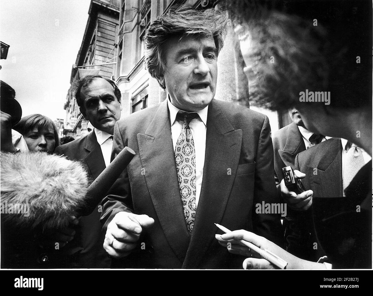 Radovan Karadzic Bosnian Serb Leader surrounded by journalists and talking to themDBase Stock Photo