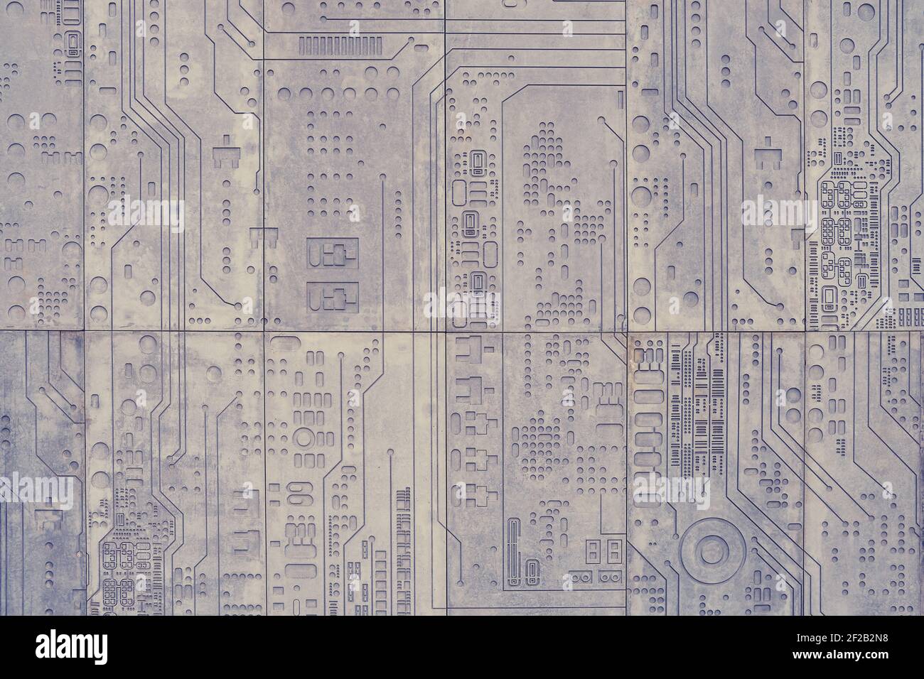 Concrete wall background with carved technological electronics circuit pattern Stock Photo