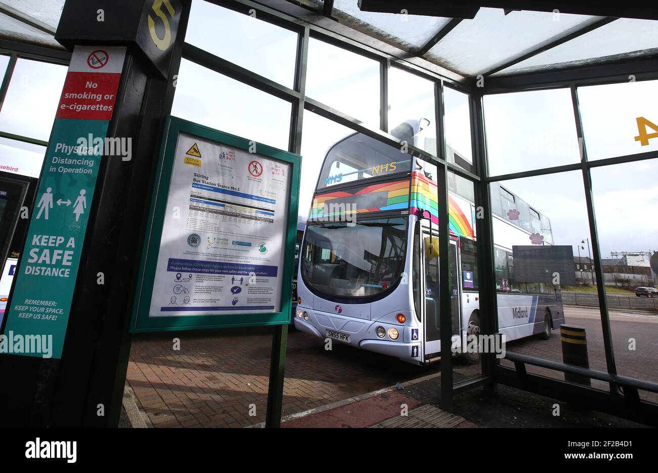 A bus decorated with a rainbow and NHS stickers departs from Stirling bus station, as lockdown A bus decorated with a rainbow and NHS stickers departs from Stirling bus station, as lockdown