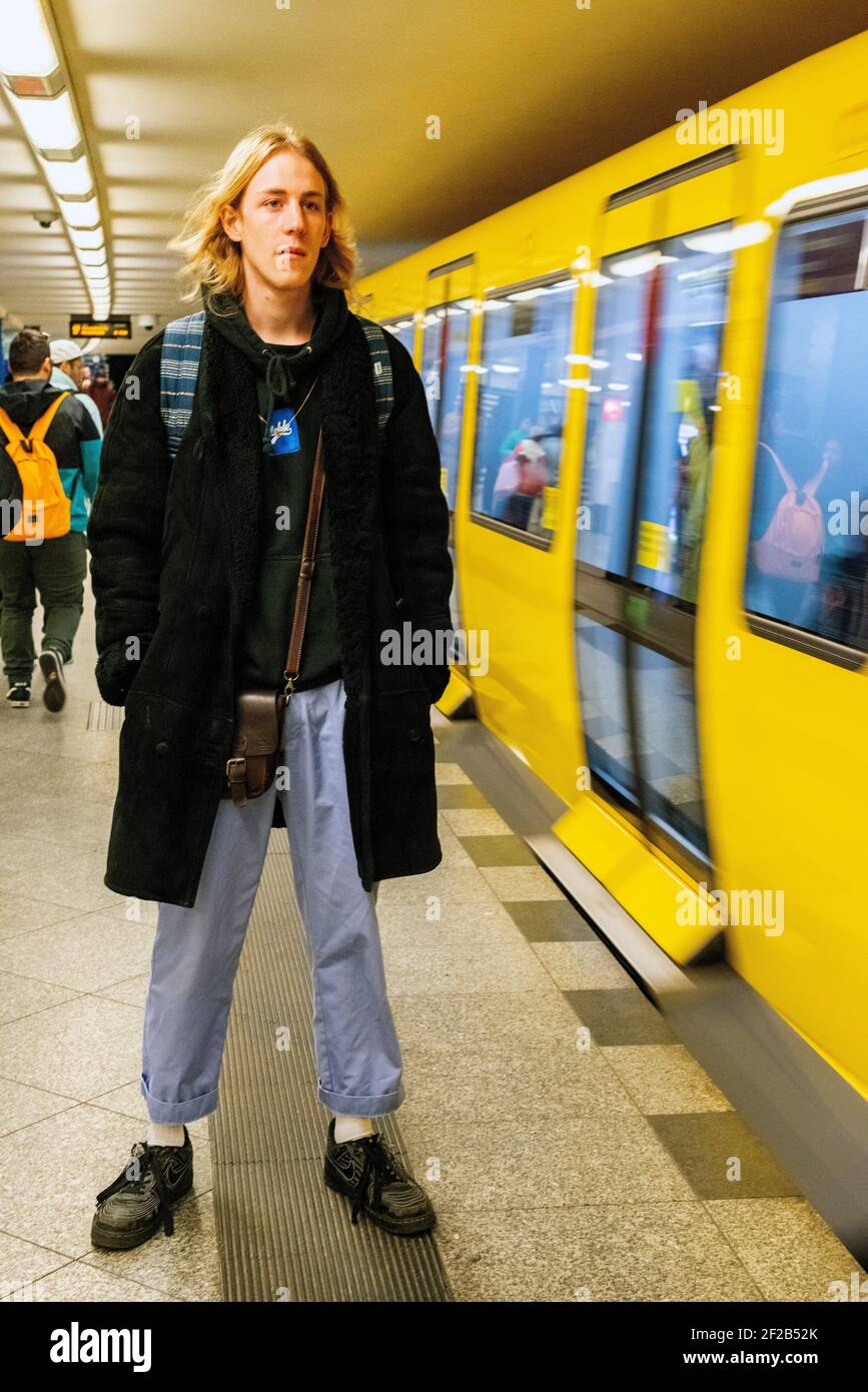 Berlin, Germany. A young, male music student commuting the underground  U-Bahn through easter parts of the German Capitol betwee home, univertsity  and leisure spots Stock Photo - Alamy