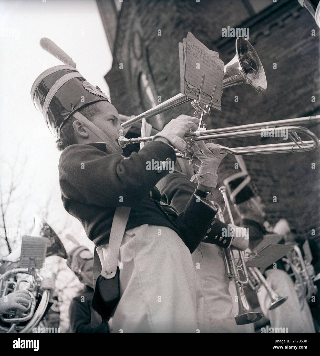 Boy orchestra in the 1940s. Lars Nilsson of Skansens childrens orchestra is parading on may 5 1940. He plays the trombone. Sweden ref 121-18 Stock Photo
