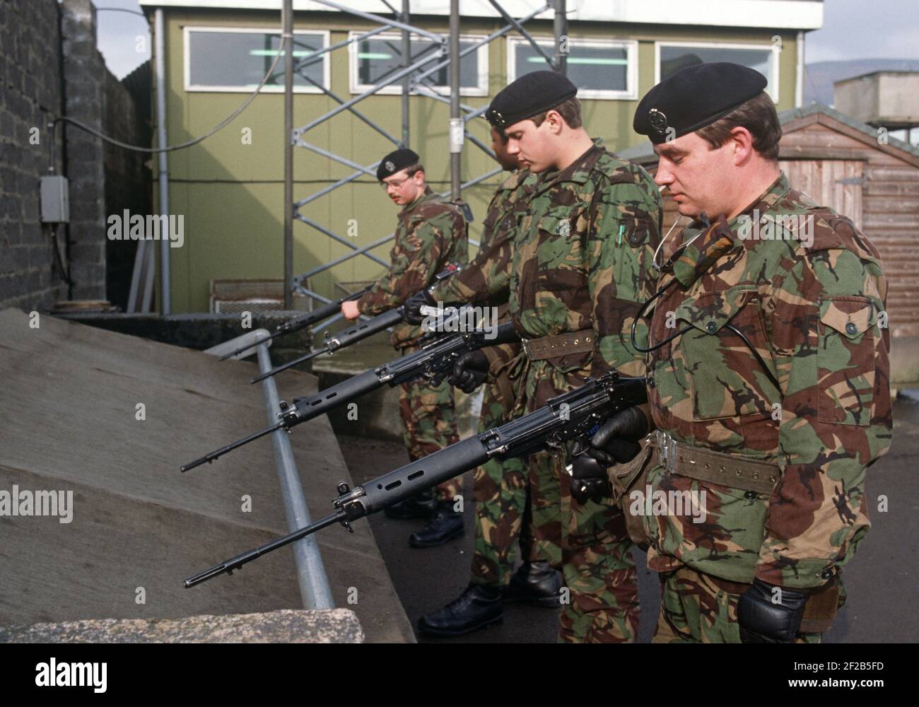 British Army Soldiers Unloading Weapons In Belfast Army Base During The