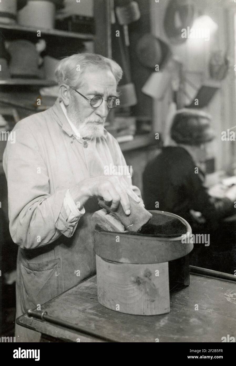 Hatmaker in the 1920s. An elderly man but with an aura of craftsmanship