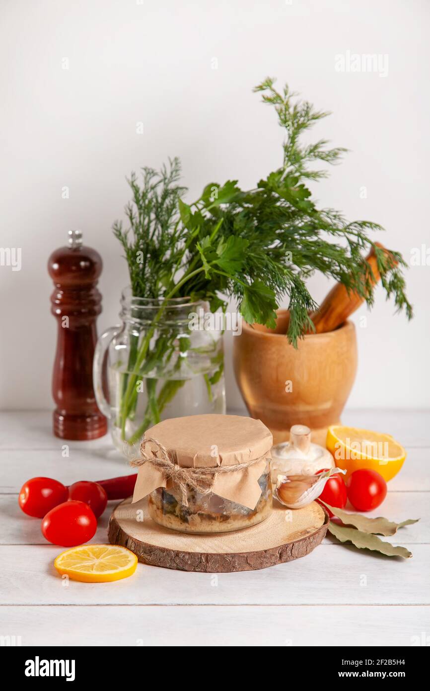 Homemade canned fish from mackerel in oil. Glass jars with canned fish