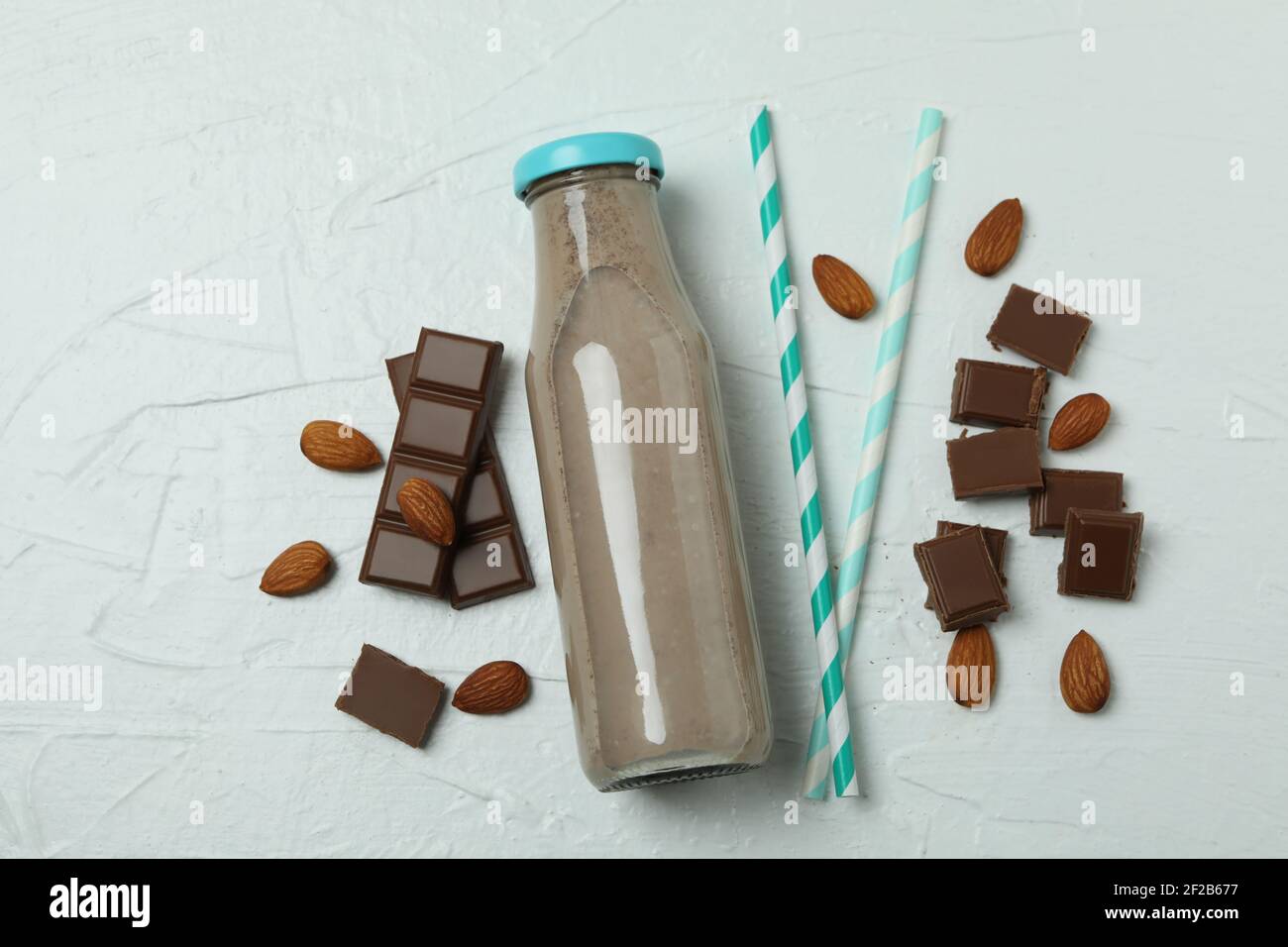 Chocolate milk shake milkshake in a bottle cup straw isolated on a white  background Stock Photo - Alamy