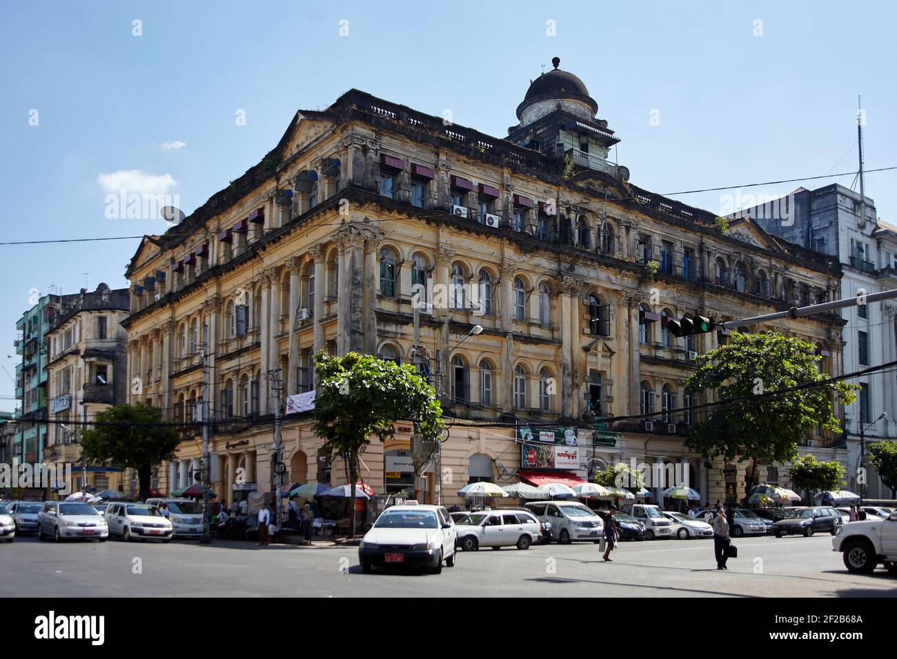 beautiful old colonial architecture along Maha Bandula Road, Yangon, Myanmar Stock Photo