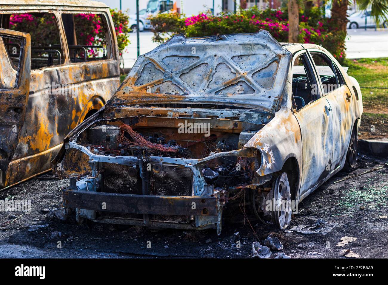 Remains of a car destroyed by fire Stock Photo Alamy