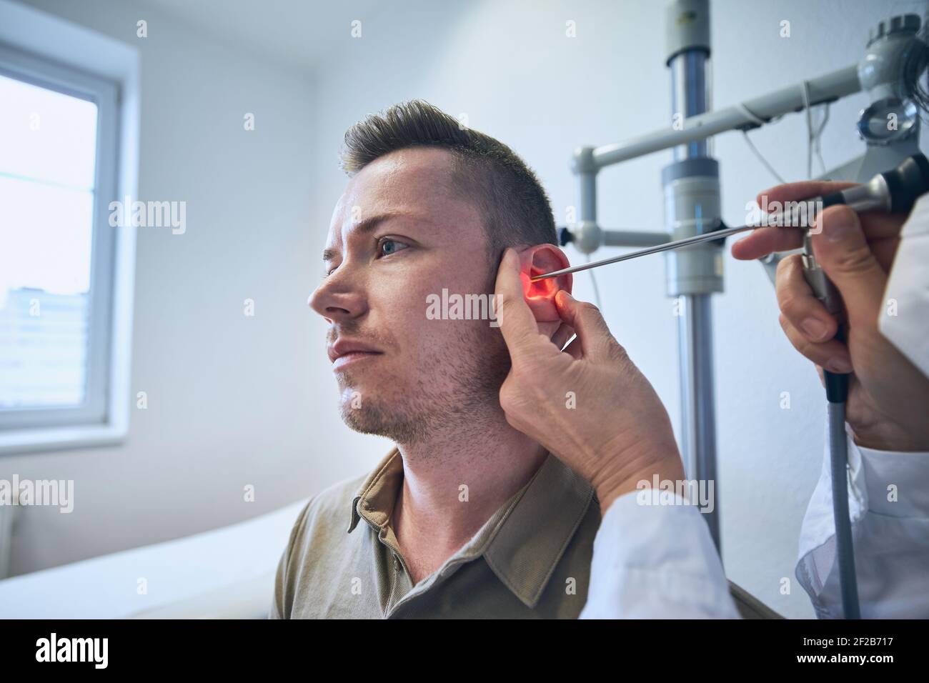 Doctor ear examination hires stock photography and images Alamy