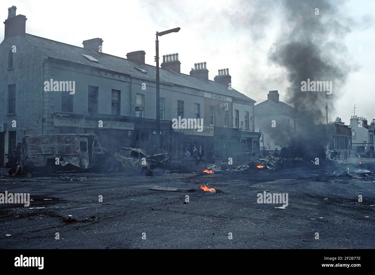 BELFAST, UNITED KINGDOM - August 1976.. Morning after a night of riots in the Falls Road, West Belfast during The Troubles, Northern Ireland, 1970s Stock Photo