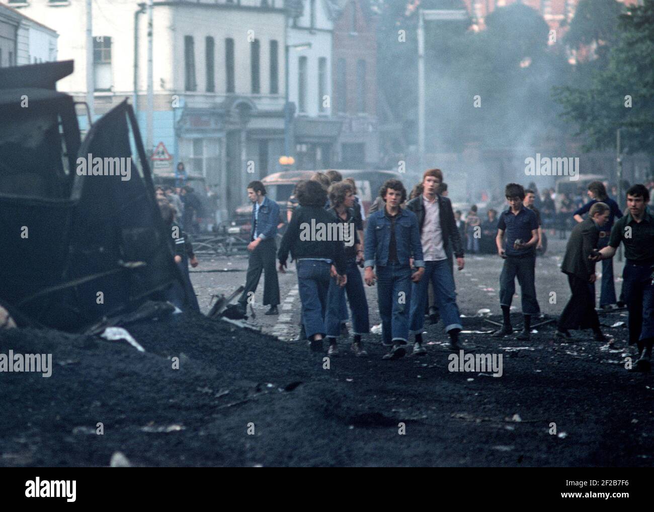 BELFAST, UNITED KINGDOM - August 1976.. Morning after a night of riots in the Falls Road, West Belfast during The Troubles, Northern Ireland, 1970s Stock Photo