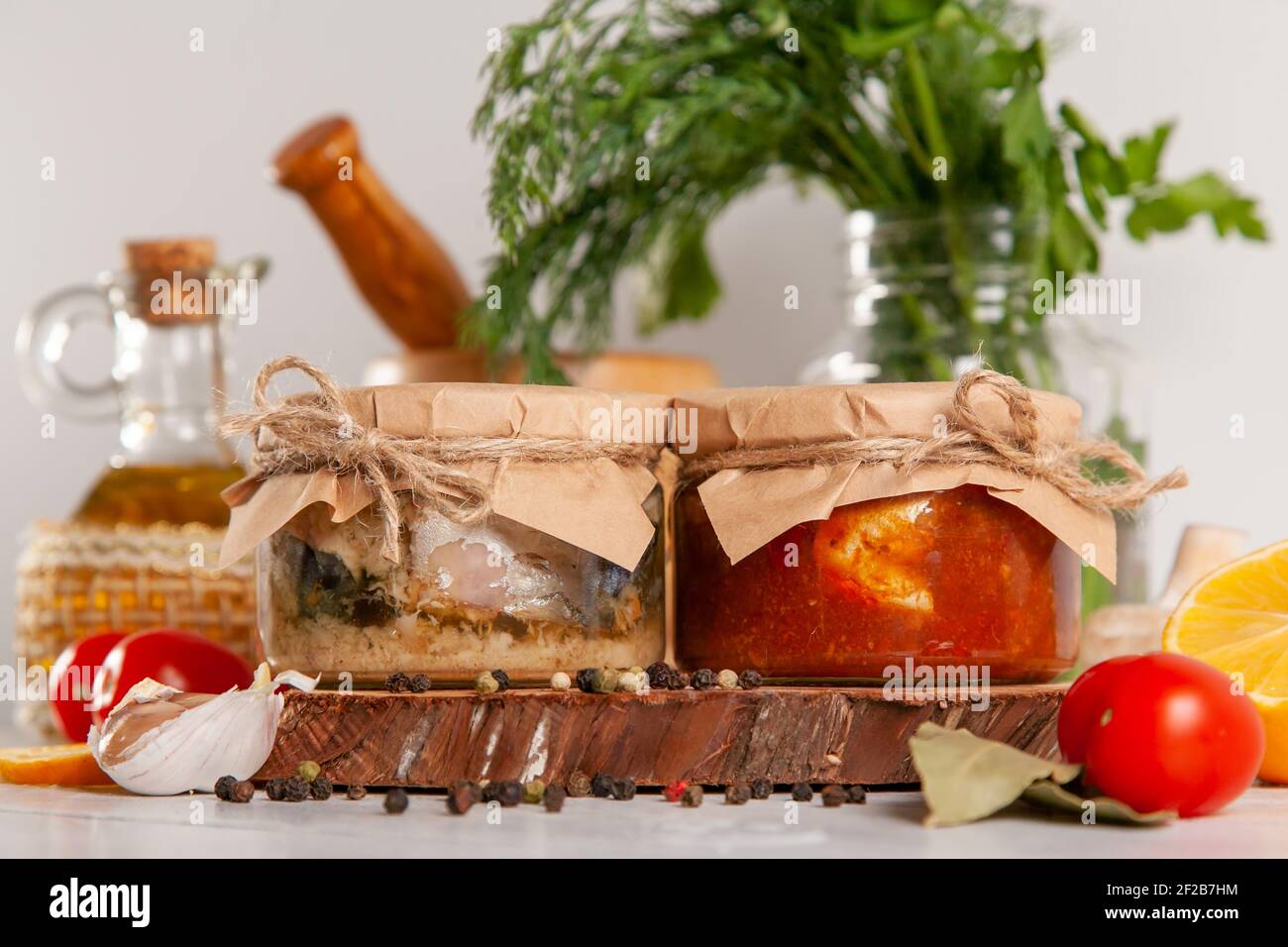 Homemade canned fish from mackerel in oil and tomato paste. Glass jars