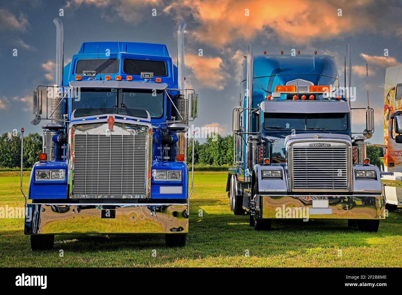 ALAHARMA, FINLAND - AUGUST 11, 2017: Blue classic American Kenworth and Freightliner semi tractors displayed on Power Truck Show 2017. Stock Photo