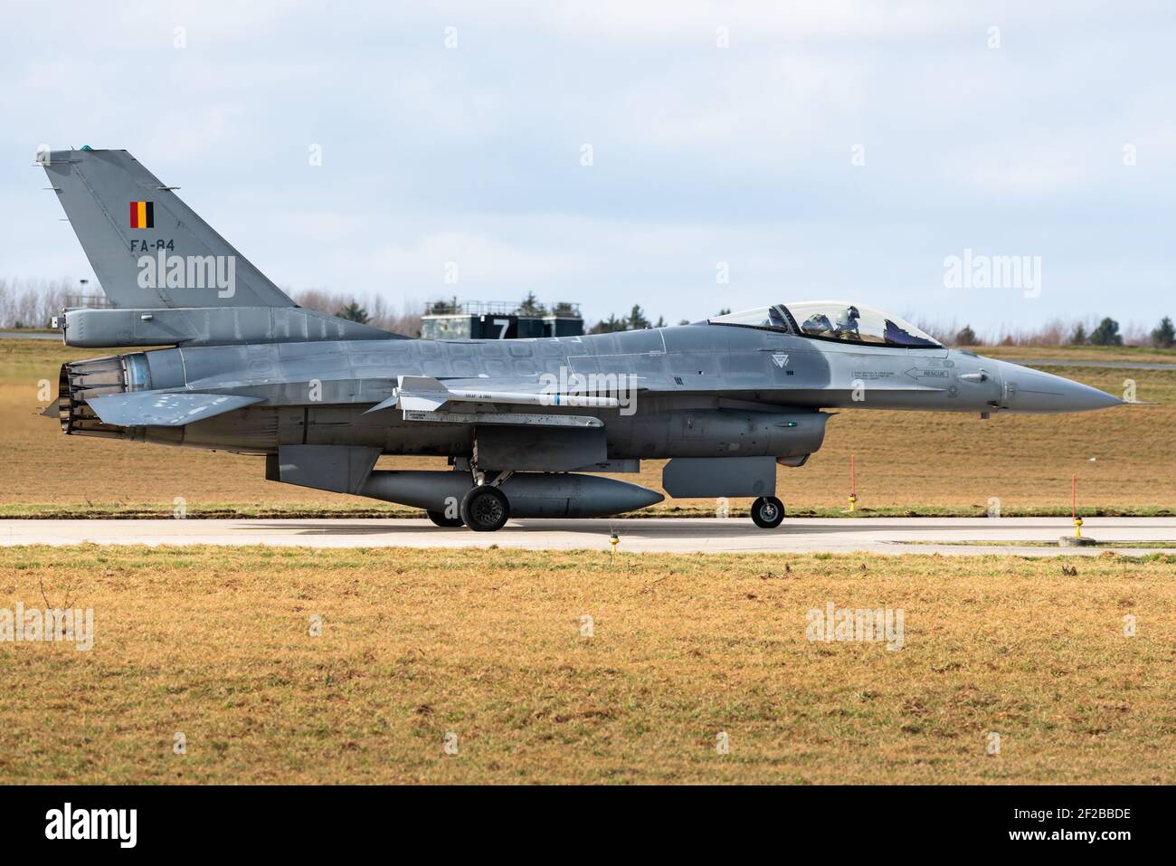 A Lockheed F-16 Fighting Falcon fighter jet of the Belgian Air Force at the Florennes Air Base. The F-16 is a single-engine multirole fighter jet. Stock Photo