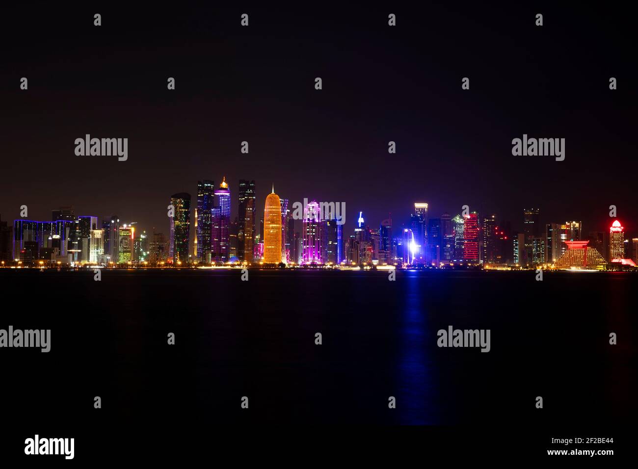 DOHA, QUATAR - JANUARY 21, 2019: View at Doha, Quatar at night. Doha is the capital and most populous city of the State of Qatar Stock Photo