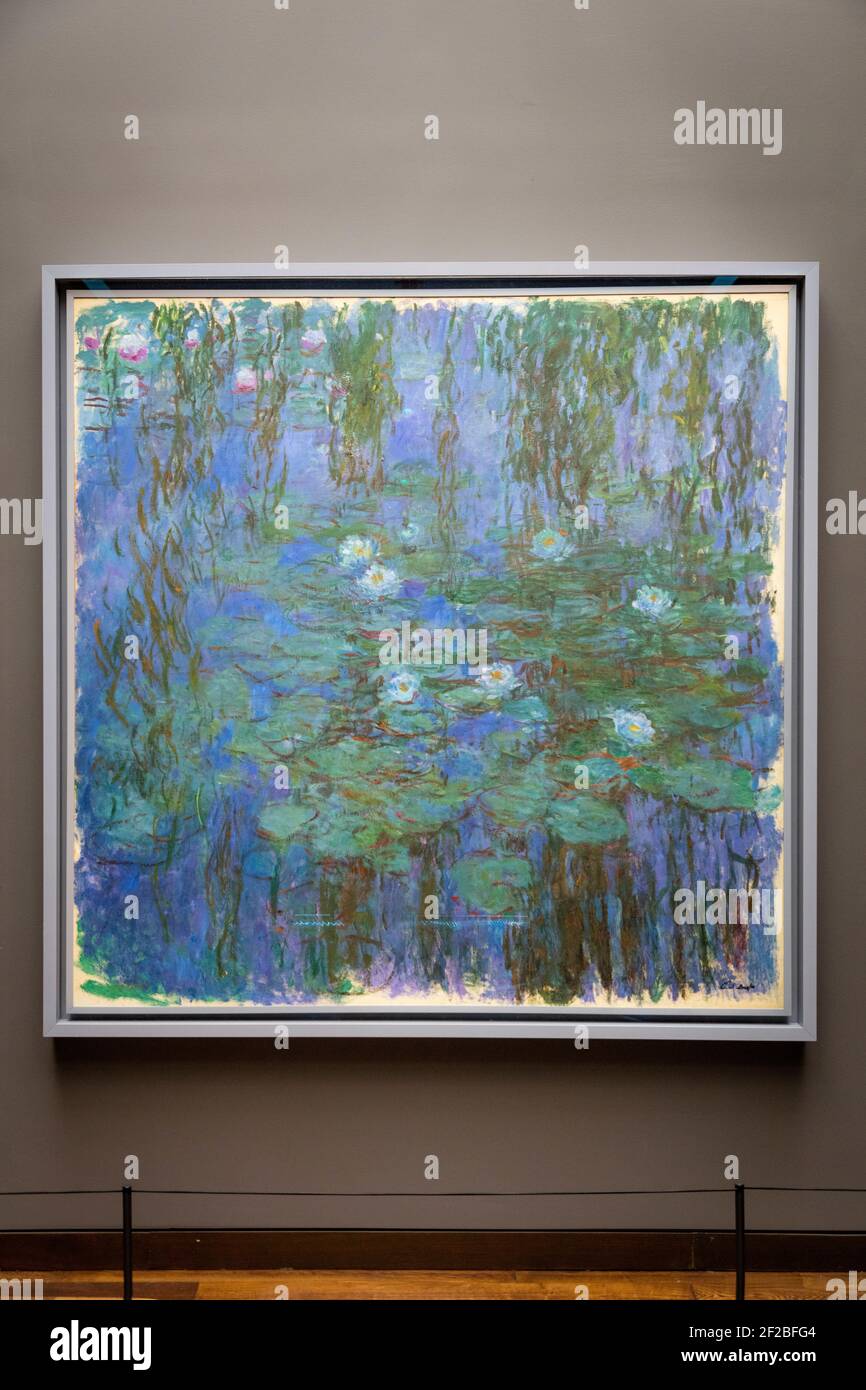 Water Lilies - one of approximately 250 in the famous series painted by Claude Monet, on display at Musee d'Orsay, Paris, France Stock Photo