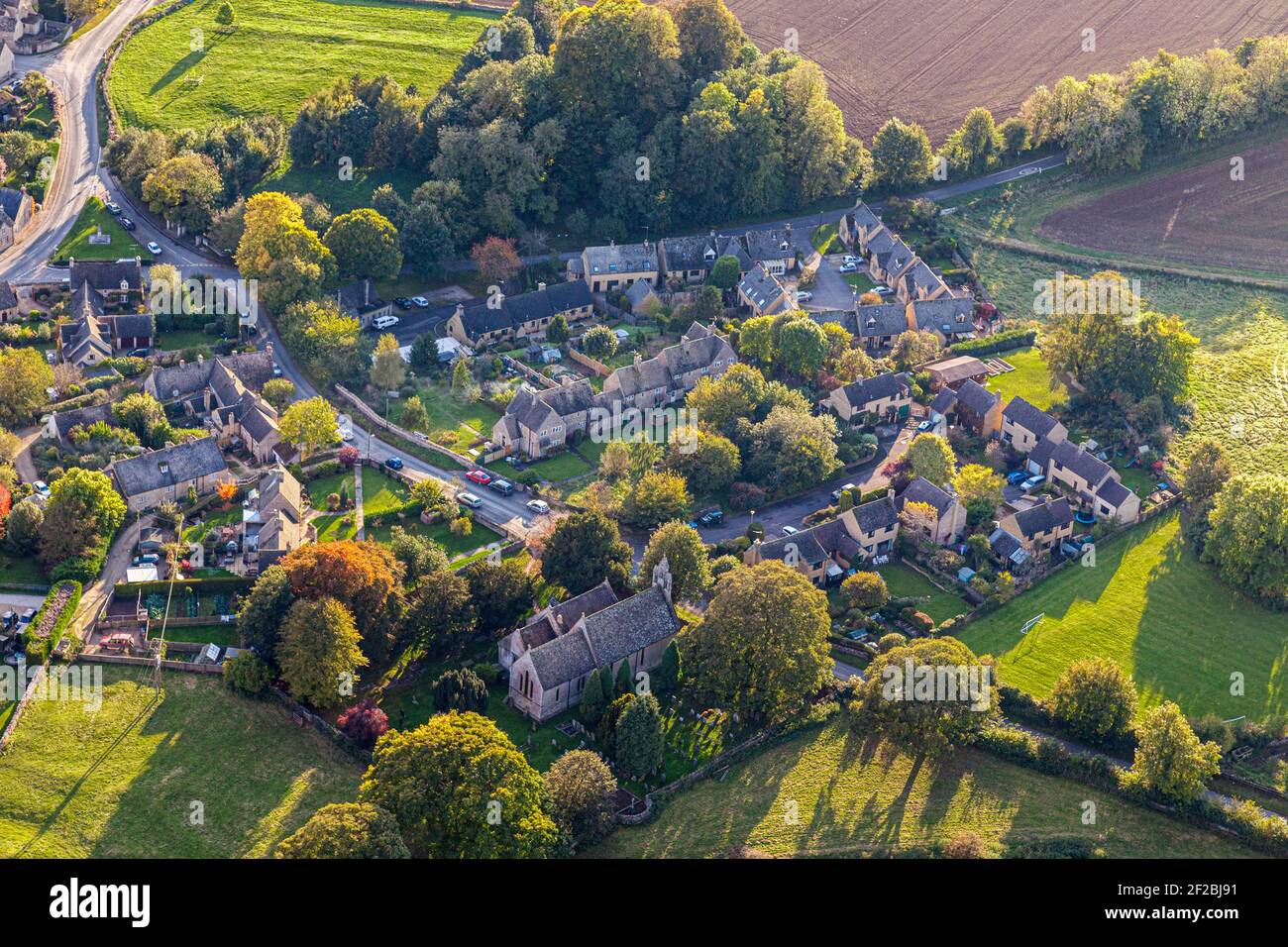 An aerial view of the Cotswold village of Lower Swell, Gloucestershire, UK Stock Photo