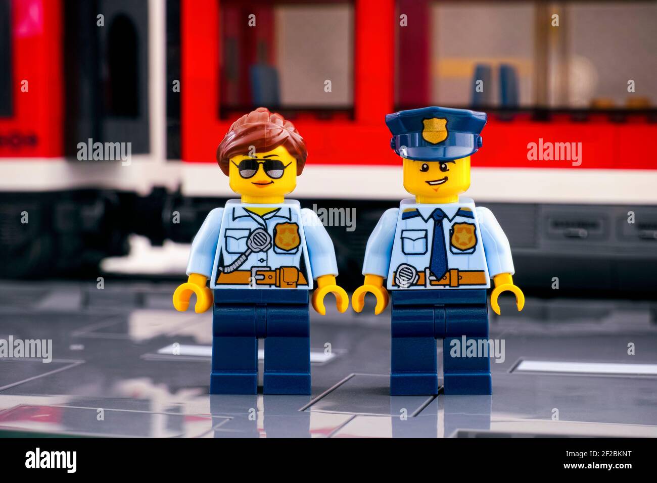 Tambov, Russian Federation - March 03, 2021 Two Lego police officers  standing on the platform in front of a red train Stock Photo - Alamy