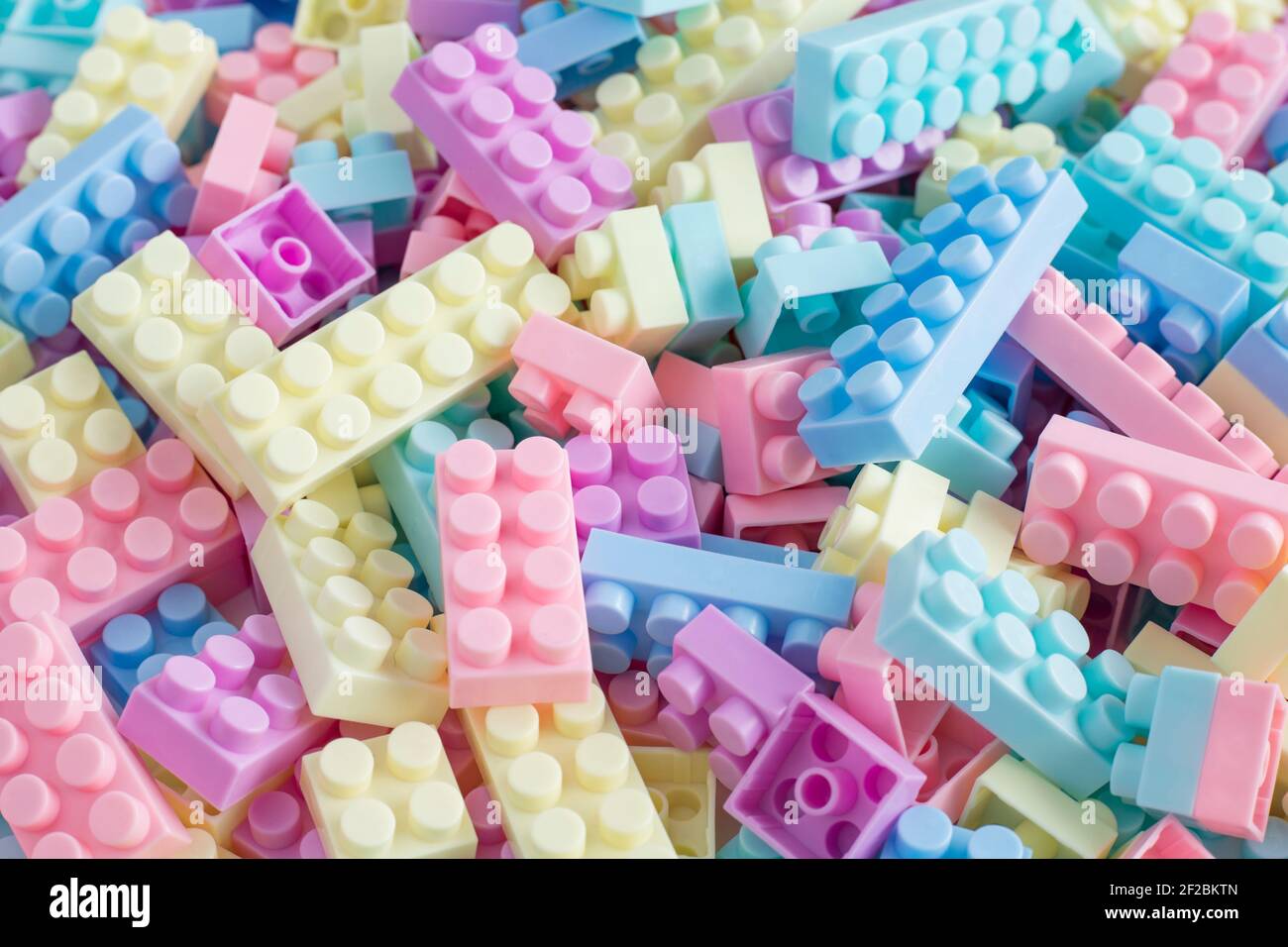 Pile of colorful plastic toy building blocks Stock Photo
