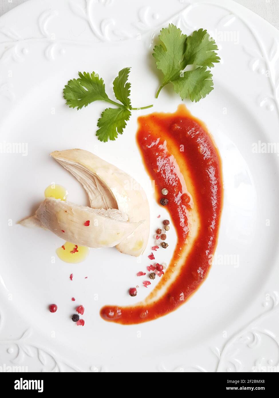 Tomato sauce for chicken on white background Stock Photo