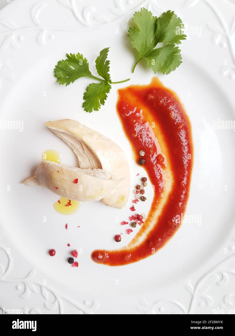 Tomato sauce for chicken on white background Stock Photo