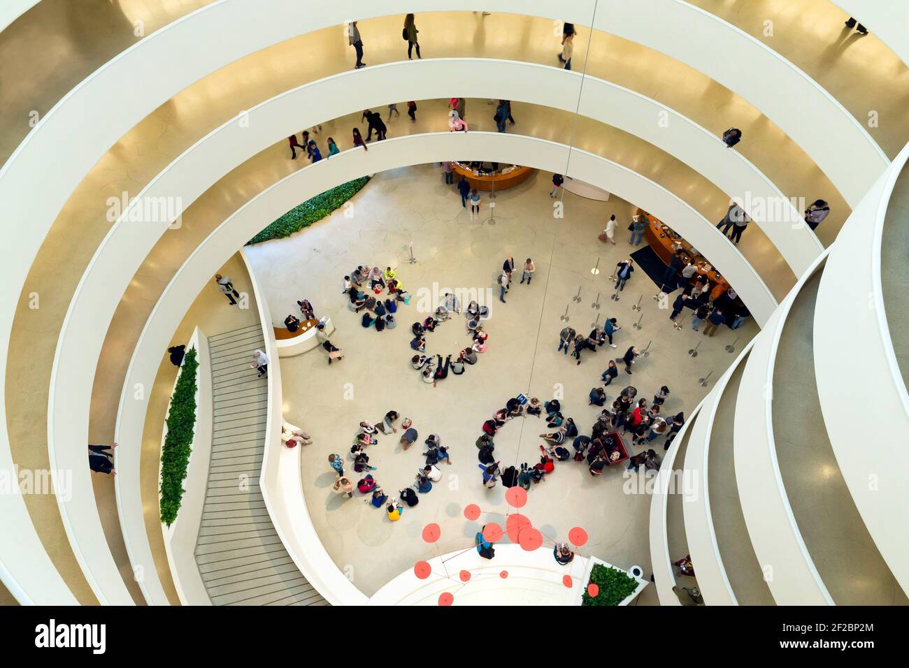Visitors and schoolchildren, interior of Solomon R. Guggenheim Museum, Manhattan, New York City, USA, North America Stock Photo