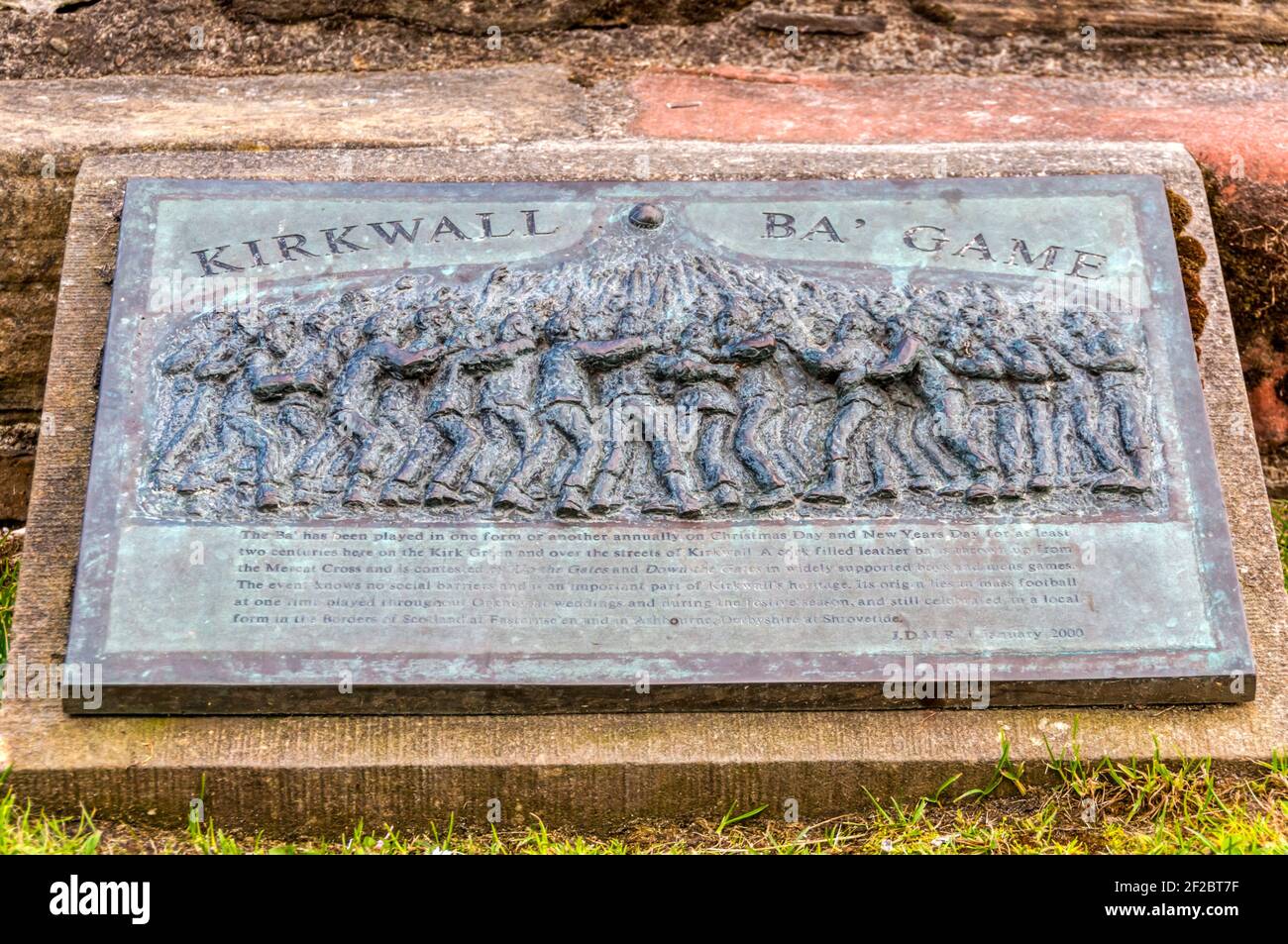 A plaque commemorating the Kirkwall Ba' Game in Kirkwall, Orkney. Stock Photo