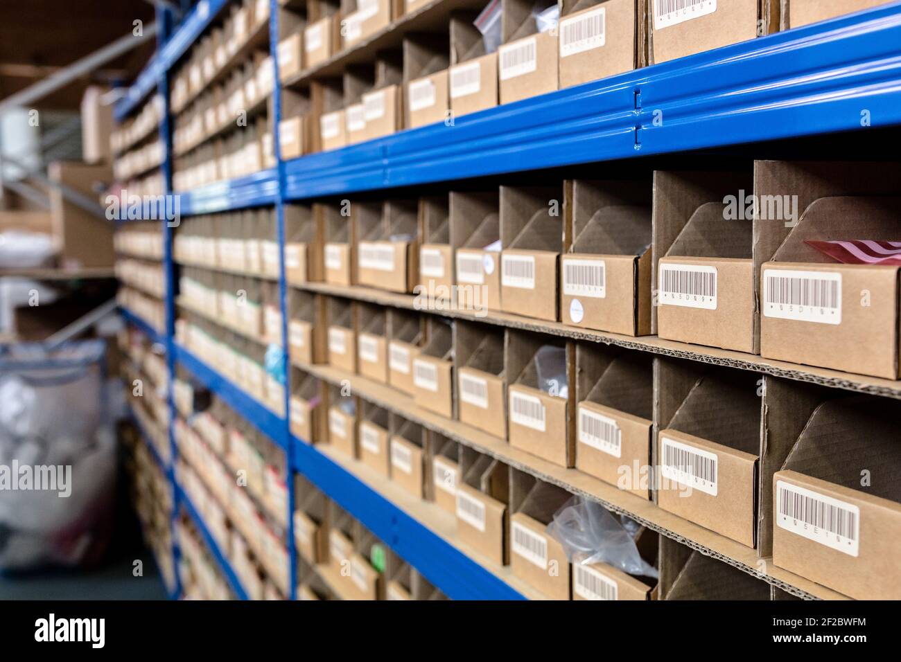 Up close view of pigeon holes used in a factory warehouse for storage of the raw materials. Warehouse, stores, storage, raw materials concept Stock Photo