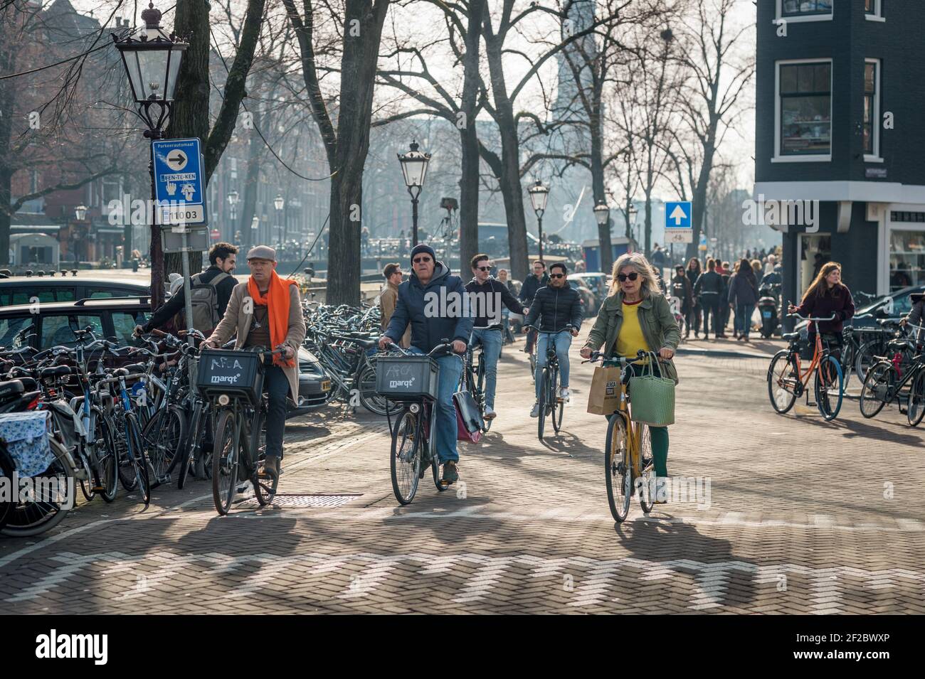 Cyclists on Prinsengracht, Amsterdam, Netherlands. Stock Photo