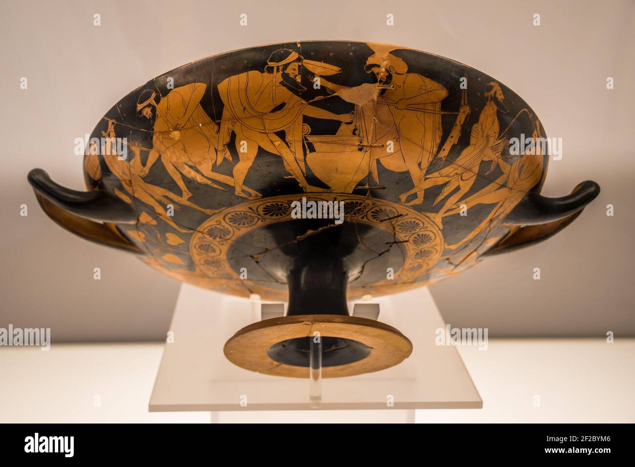 In the pottery of ancient Greece, a kylix is the most common type of wine-drinking cup. The National Archaeological Museum of Naples (Italian: Museo A Stock Photo