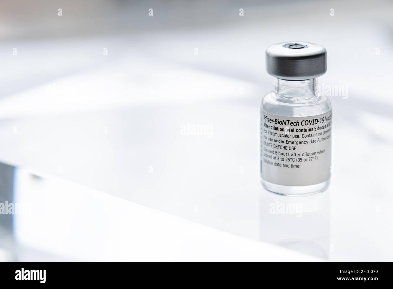 Montreal, CA - 2 March 2021: Vial of Pfizer BioNTech Covid-19 vaccine Stock Photo