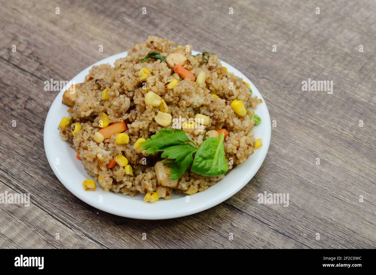 A vegan or vegetarian vegetable fried rice Stock Photo - Alamy