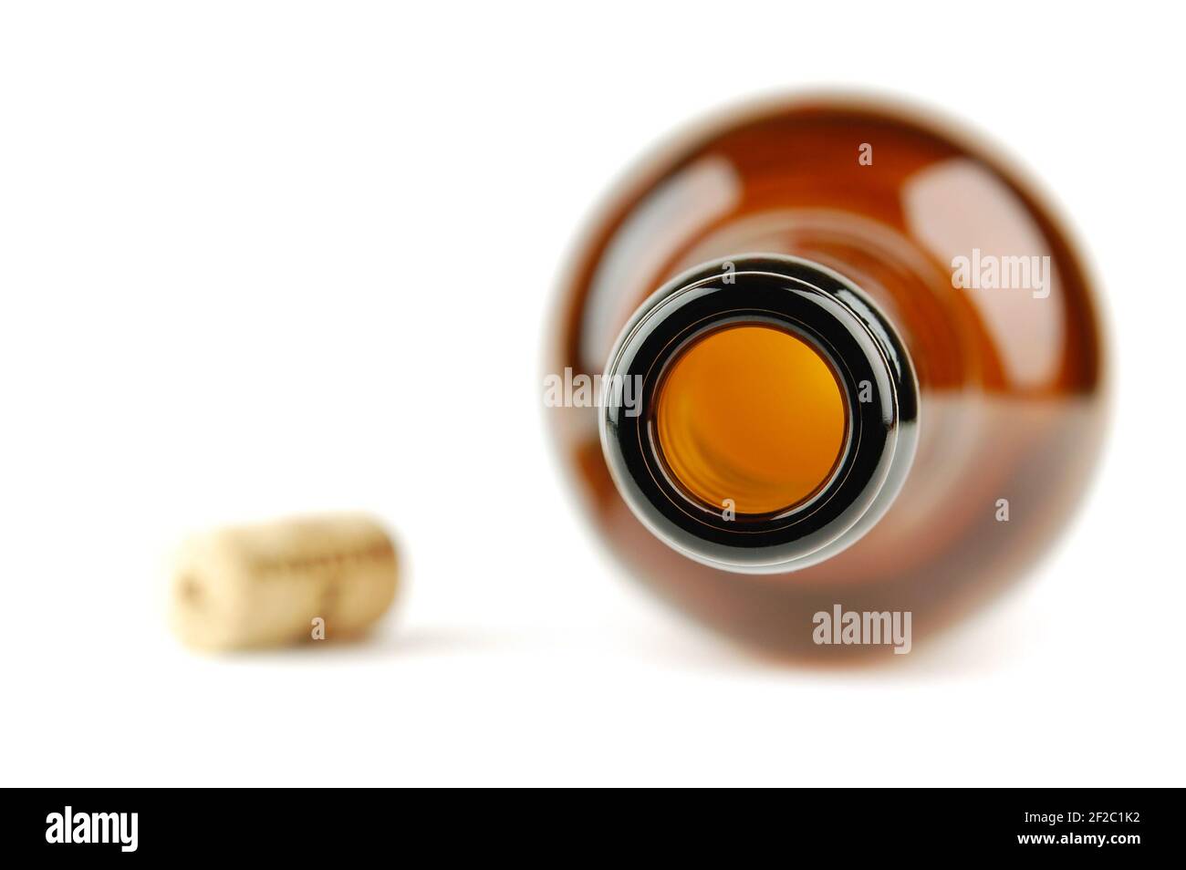 Empty wine bottle with cork isolated on a white. Selective focus. Stock Photo