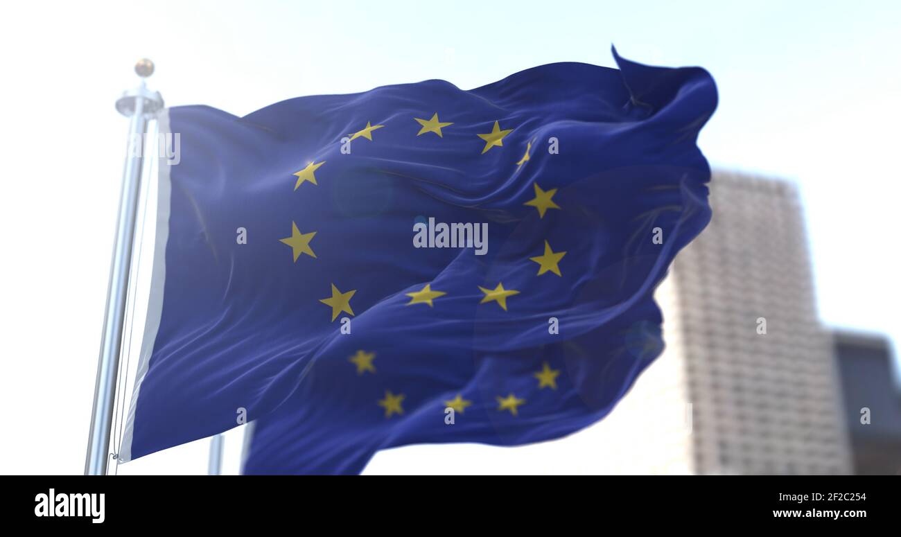 Two European flags flapping in the wind. European Union and Economic Community. Politics and Economy. Transnational political government Stock Photo
