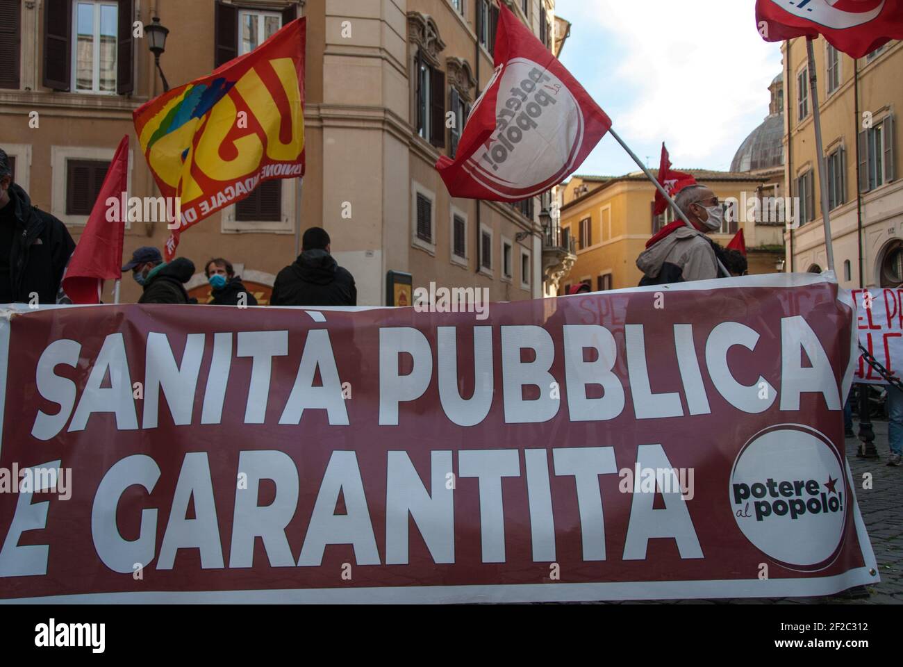Rome, Italy. 11th Mar, 2021. Rome 11 March, Communist Refoundation, Power to the People and other left-wing acronyms in Piazza Montecitorio. 'Right to health for all', 'The common good must prevail over the profit of companies' Credit: Independent Photo Agency/Alamy Live News Stock Photo