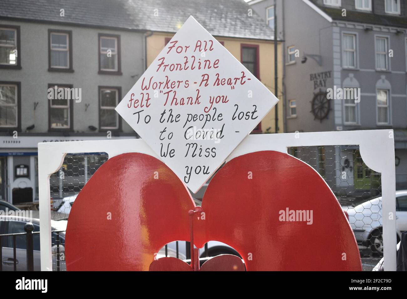 Bantry, West Cork, Ireland. 11th Mar, 2021. Bantry Bay Lions club placed a big heart on Wolfe Tone Square. This gesture is to say a thank you to all the frontline workers for their work during Covid 19 times, it also shows support to those families whose members are no longer with them. Credit: Karlis Dzjamko/Alamy Live News Stock Photo