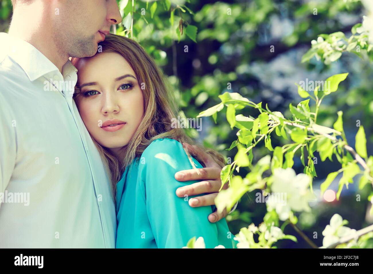Young happy couple in love outdoors. loving man and woman in a park ...