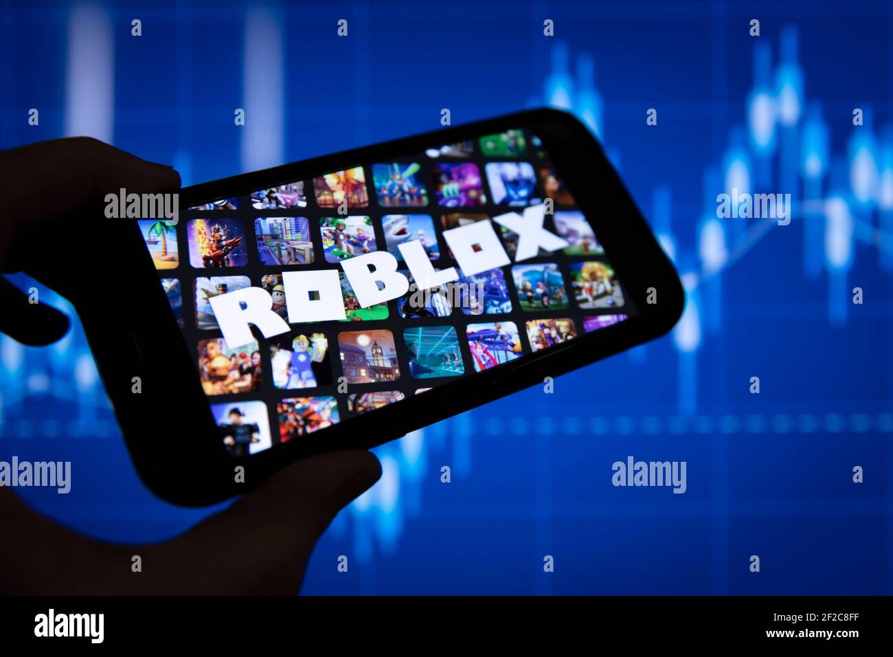 ROBLOX app seen on the screen of ipad which is in the hands of  unrecognisable child. Concept. Stafford, United Kingdom, May 18, 2021 Stock  Photo - Alamy