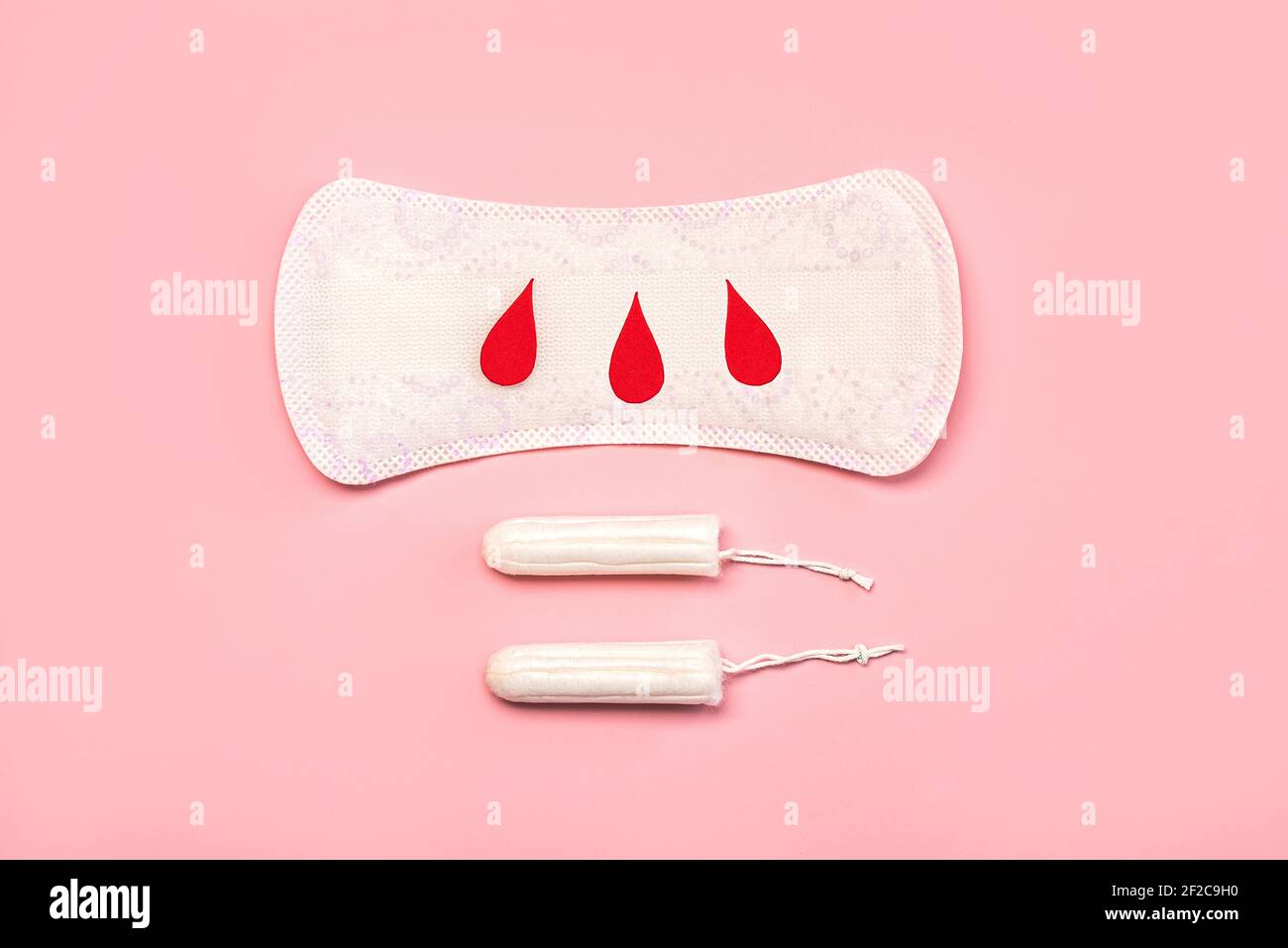 https://c8.alamy.com/comp/2F2C9H0/menstrual-sanitary-pads-or-napkins-with-paper-blood-drops-on-pink-backgroundfemale-intimate-gynecological-hygiene-concept-2F2C9H0.jpg