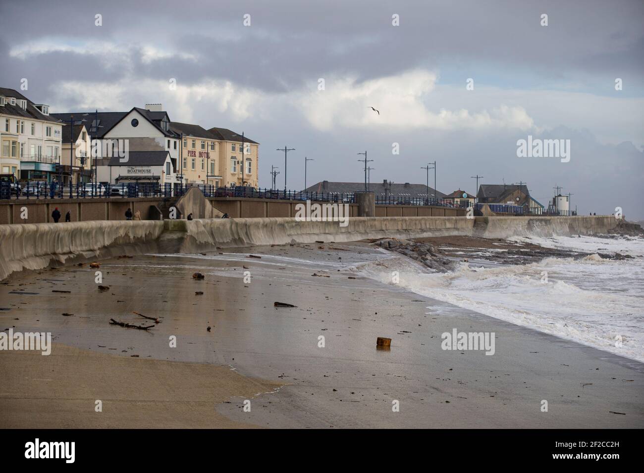 A view of Porthcawl Town Beach during high tide and strong winds of 67mph hit the South Wales Coast on the 11th March 2021. Credit: Lewis Mitchell Stock Photo
