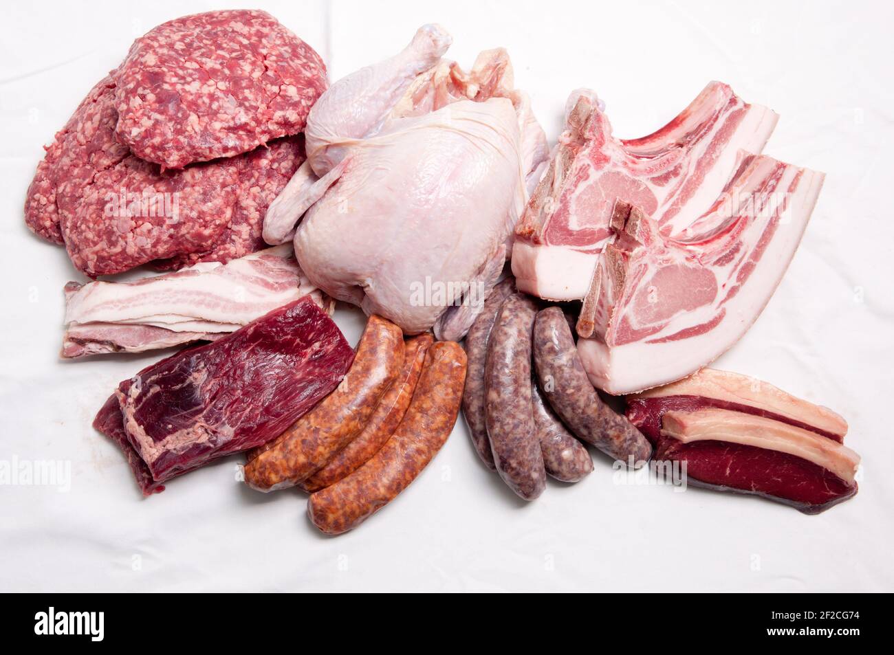 A top view of the assortment of fresh meat productsisolated in the ...