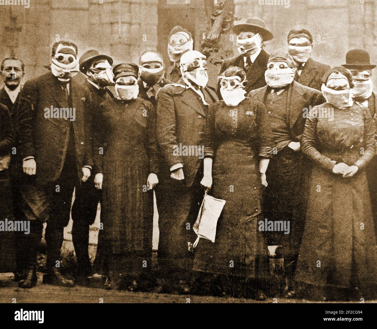 WWI - The Mayor & City Council of Rheims aka Reims  (Dr Langlet Mayor - centre) outside the Town Hall wearing anti-gas masks. In World War I   the city was bombarded by the Germans and badly damaged. Stock Photo