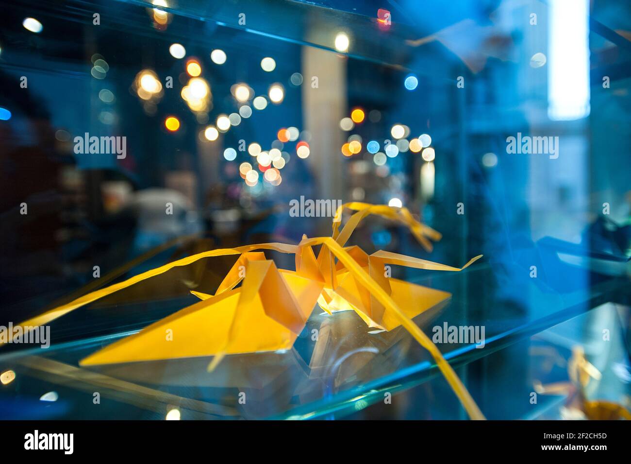 Origami paper folding in window display, Barcelona, Catalonia, Spain Stock Photo