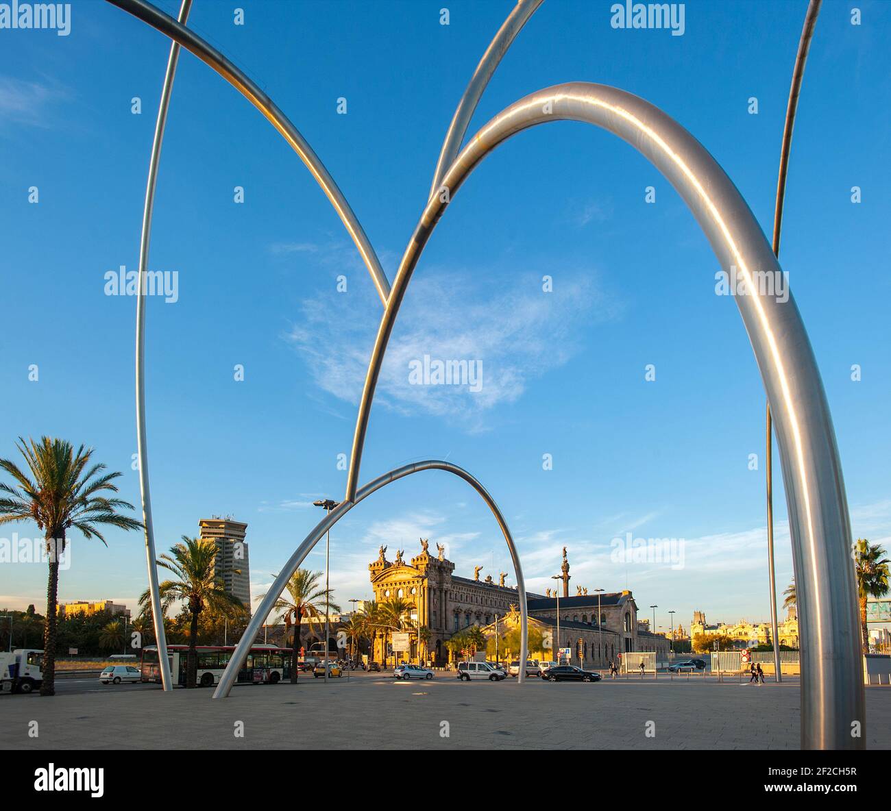 Onades Waves Sculpture by Andreu Alfaro with Aduana building in port vell area, Barcelona, Catalonia, Spain Stock Photo