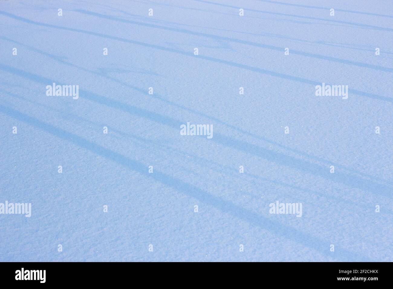 Snow background, white blanket and lines with shadows Stock Photo
