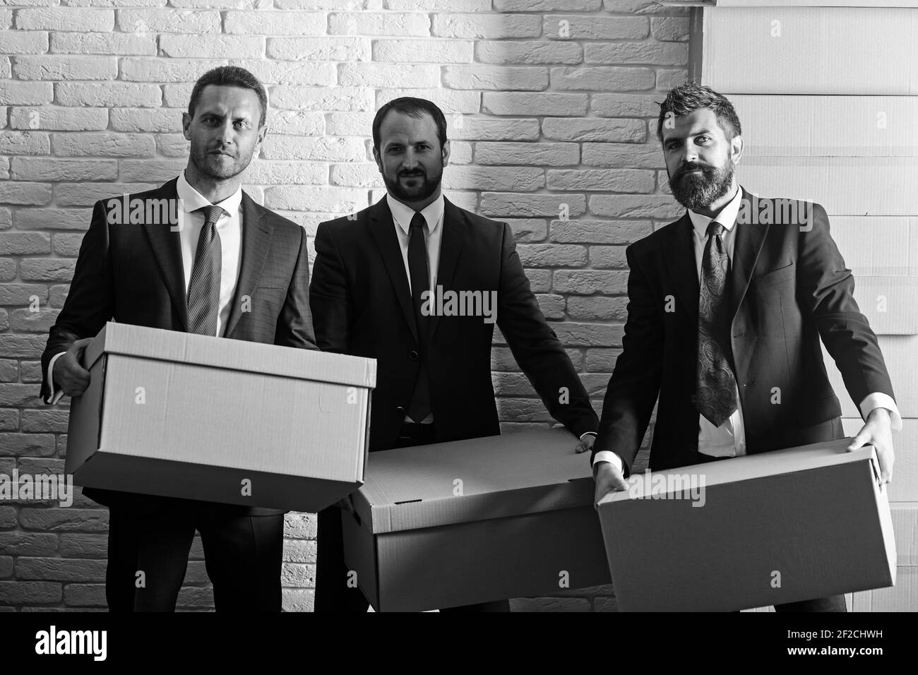 Businessmen wear smart suits and ties. Men with beard Stock Photo - Alamy