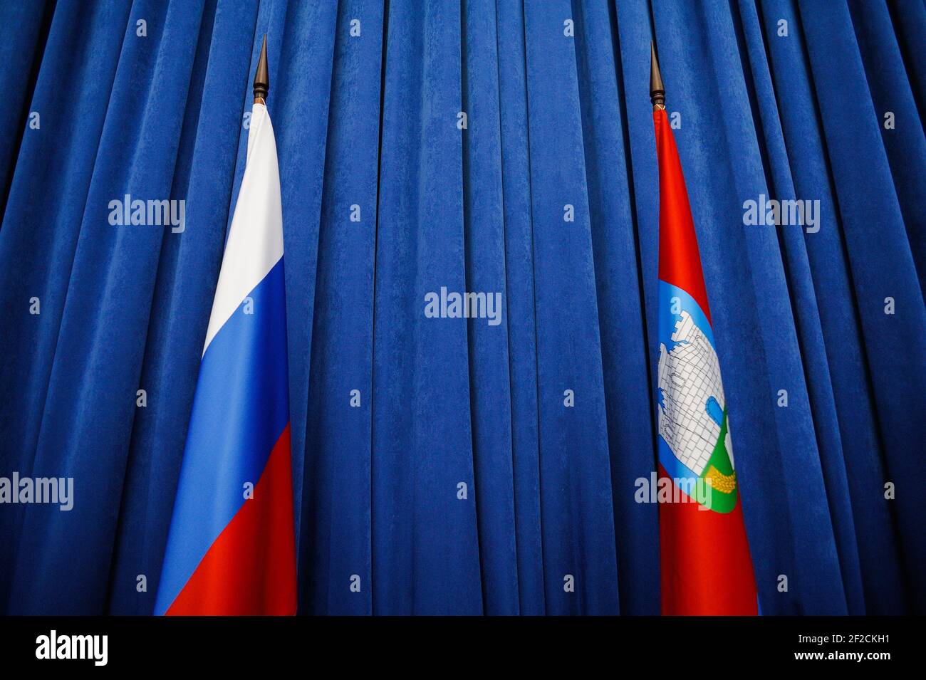 Flags of Russian Federation and orel Region on blue background horizontal Stock Photo