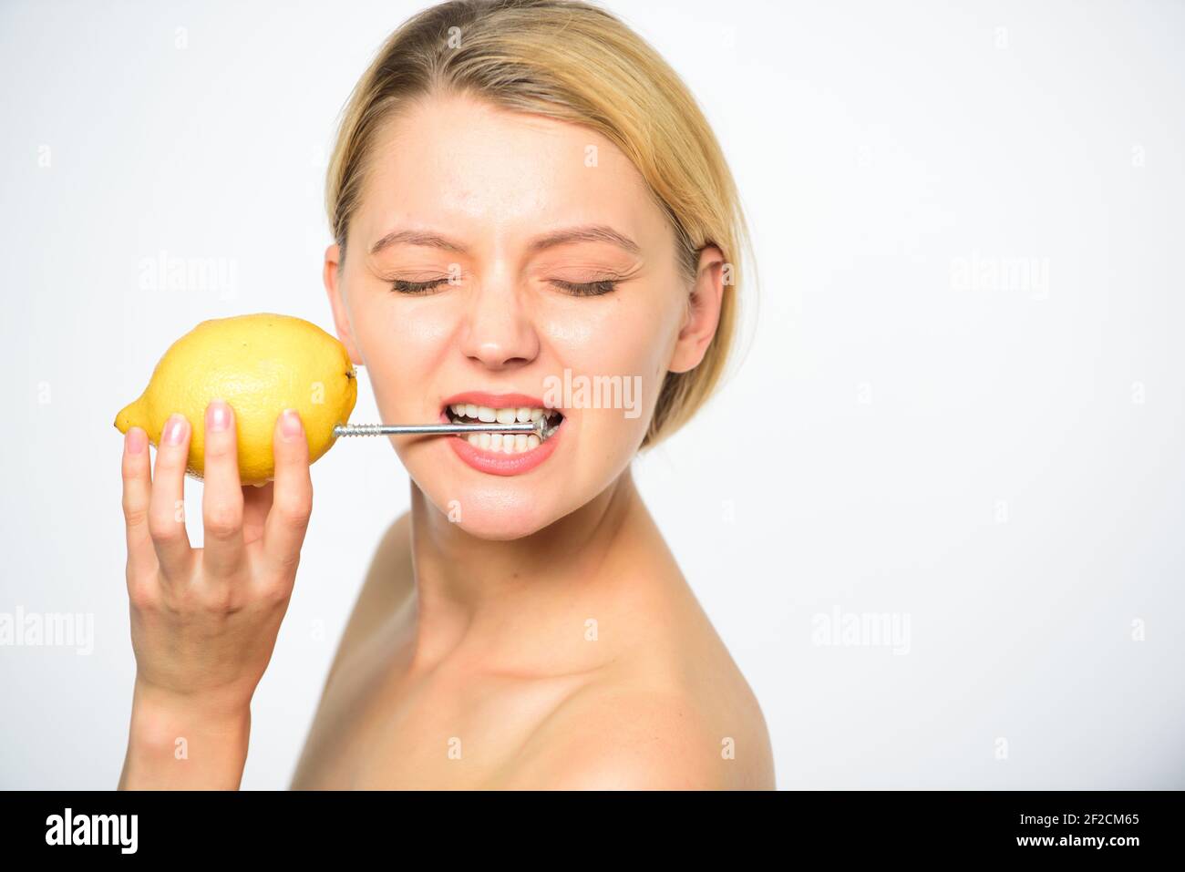 Lemon with hobnail natural battery. Recharge your body vitamins. Girl