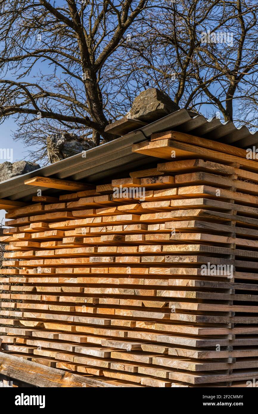 Wooden planks and beams. Airdrying timber stack. Wood air drying. Wood